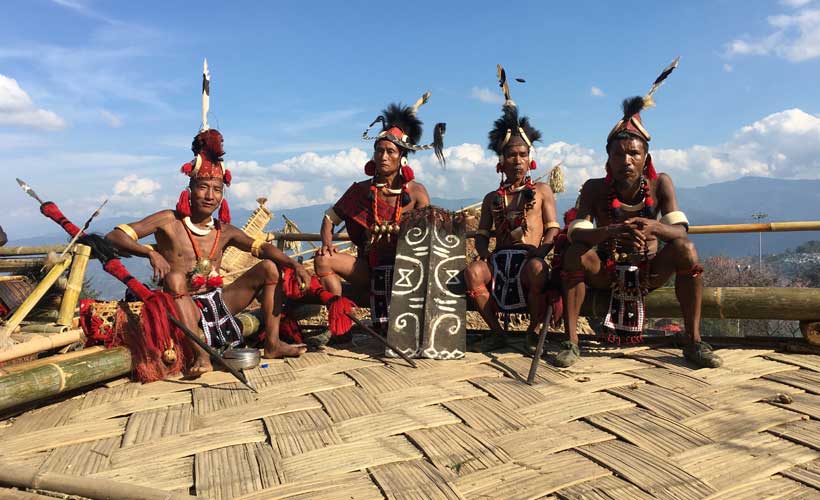 Men dressed in tribal clothing for Nagaland festival