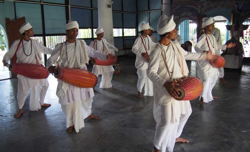 Monks performing in Krishna workship